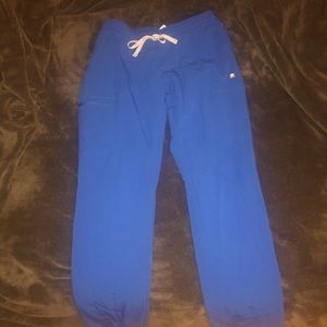 Blue FIGS, lightly worn. Size small, female. Straight leg fit.